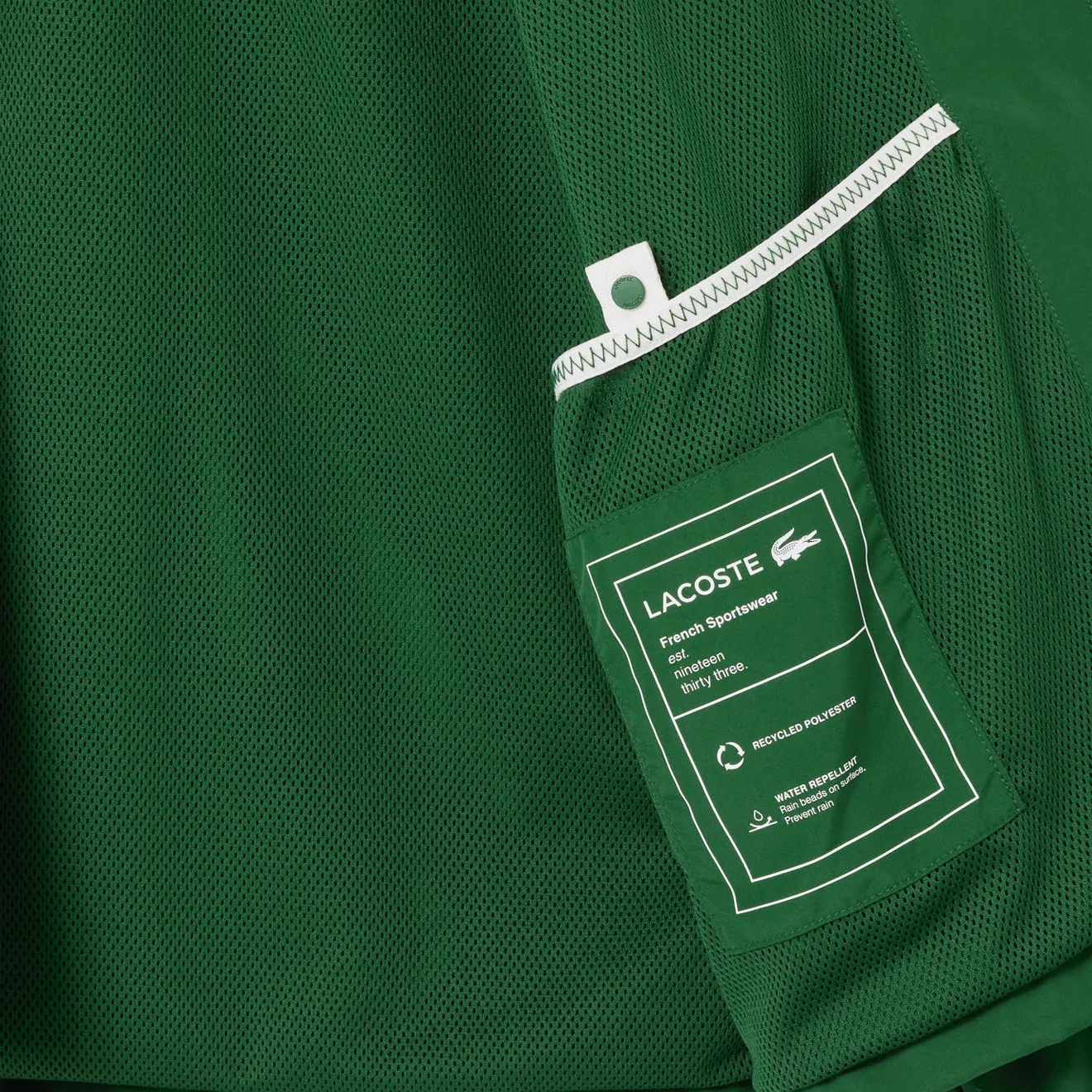Lacoste Kurze Wasserdichte Sportjacke mit abnehmbarer Kapuze in Kieferngrün